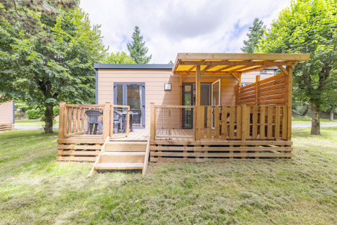 Contemporary mobile home with spacious wooden terrace at Seasonova Camping Le Val de Coise, Pays de la Loire, France