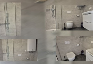 Modern bathroom facilities including shower, toilet, and sink at Seecamping Kleblach-Lind – Lodges Karinthië.