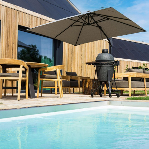 Patio esterno presso Unbrick One | Sauna e Piscina al Brinckerduyn, con piscina, sedie e barbecue.