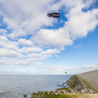 Kitesurfer on the Lauwersmeer, Groningen, Netherlands, - editorial use