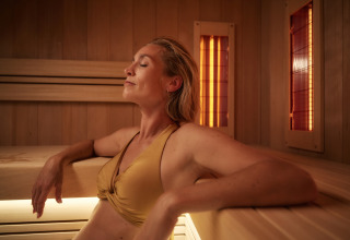 Woman relaxes in sauna - Vodatent - Brinckerduyn - Appelscha - Friesland - Netherlands