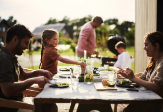 Family enjoying outdoor dining together - Vodatent - Brinckerduyn - Appelscha - Friesland - Netherlands