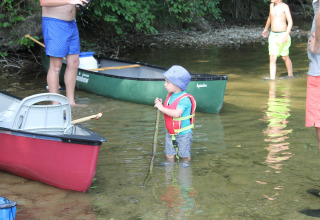 Youngster in lake with canoe - Camping Sretanwolf - Bosiljevo, Karlovac, Croatia