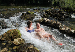 Two girls in the river - Camping Sretanwolf - Bosiljevo, Karlovac, Croatia.