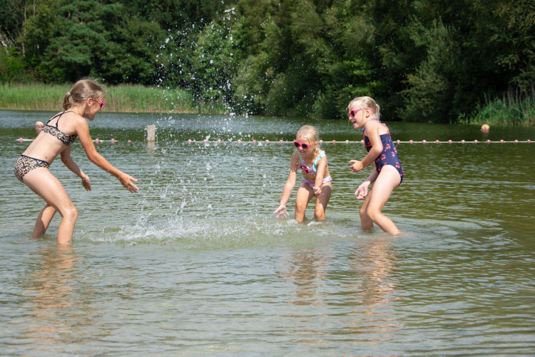 Children playing in swimming pond - Country Resort De Papillon - Denekamp, Overijssel, Netherlands