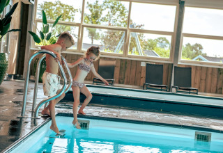Children in indoor pool - EuroParcs Bad Hulckesteijn - Nijkerk, Gelderland, Netherlands