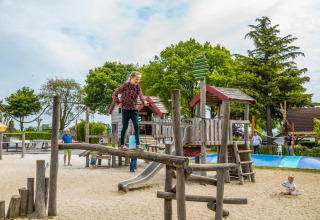 Girl on footbridge in playground - EuroParcs Gulperberg - Gulpen, Limburg, Netherlands