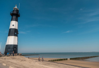 Cycling past a lighthouse - EuroParcs Schoneveld - Breskens, Zeeland, Netherlands