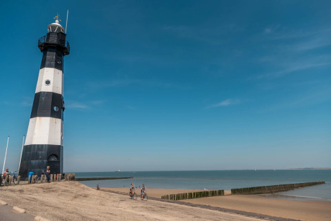 Cycling past a lighthouse - EuroParcs Schoneveld - Breskens, Zeeland, Netherlands