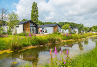 Accommodations along ditch - EuroParcs Aan de Maas - Kerkdriel, Gelderland, Netherlands