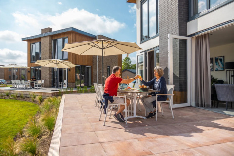 Toasting on the terrace - EuroParcs Aan de Maas - Kerkdriel, Gelderland, Netherlands