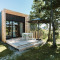 Modern tiny house met houten terras en parasol bij Holiday park De Klepperstee, Nederland