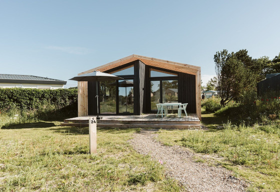 Casa de naturaleza moderna con patio exterior en Barn, Holiday park De Klepperstee en los Países Bajos.