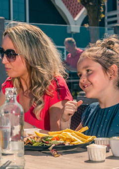 Mother and daughter on terrace - EuroParcs De Rijp - West Graftdijk, North Holland.