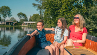 Mother with daughters in boat - EuroParcs De Rijp - West Graftdijk, North Holland, Netherlands