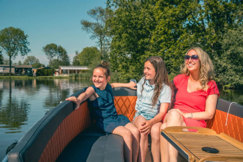 Mother with daughters in boat - EuroParcs De Rijp - West Graftdijk, North Holland, Netherlands