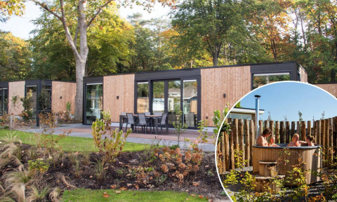 Moderno lodge Veluwehoeve Wellness con bañera de hidromasaje en Bospark Ede, Países Bajos, rodeado de naturaleza.