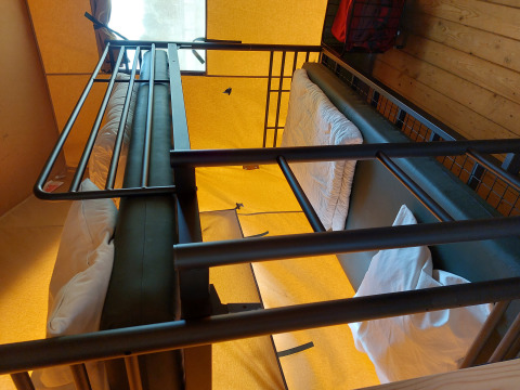 View from a bunk bed inside a glamping safari tent at Camping De Gouwe Stek in the Netherlands.