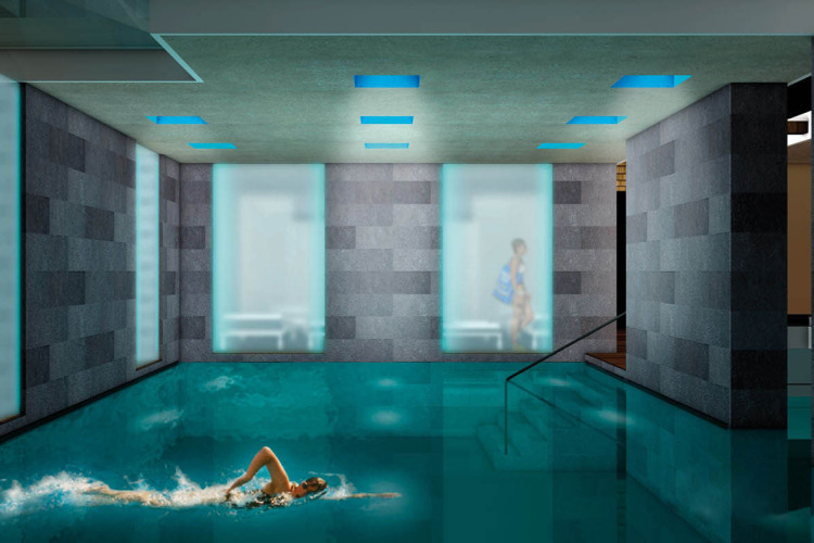 Indoor swimming pool at Camping Union Lido Mare in Veneto, Italy, featuring modern design and relaxing vibes.