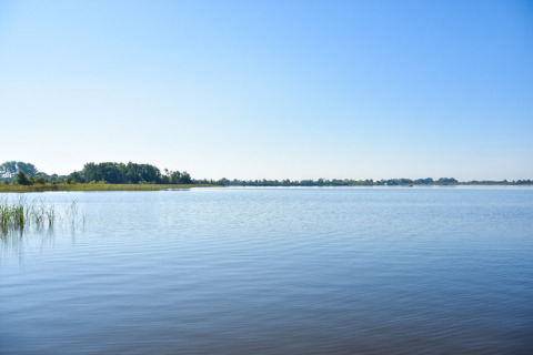 View of the lake at MarinaPark Residentie Nieuw Loosdrecht holiday park in North-Holland, Netherlands.