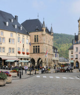 Scenic square with colorful historic buildings in Diekirch, Luxembourg, near Camping du Rivage holiday park.