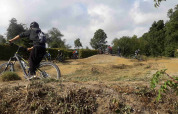 Cyclists enjoy mountain biking on rough terrain at Camping & Ferienpark Brilon, North Rhine-Westphalia.