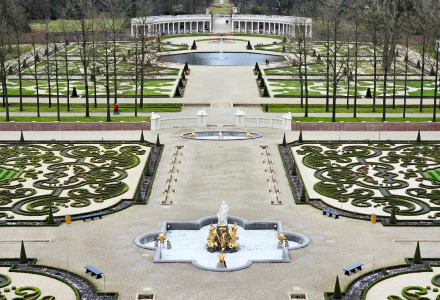 Symmetrical view of ornate gardens and fountains in classical style near Ermelo, Gelderland, Netherlands.