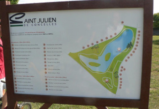 Information board with exercise trail map at Camping Seasonova du Chêne in Pays de la Loire, France.