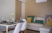 Eet- en leefruimte in Bungalow Quermany, Camping Mas Patoxas, Spanje, gezellig en modern ingericht.