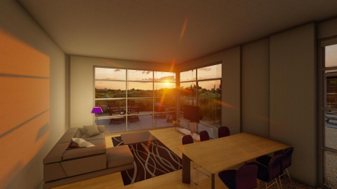 Stue i Cube Exclusif lodge ved solnedgang på EuroParcs De Zeeuwse Duinen, med udsigt til terrasse.