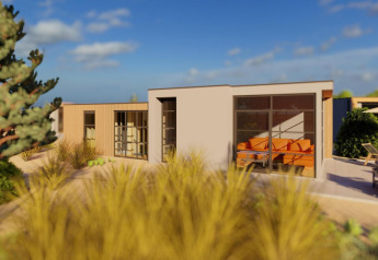 Moderne Cube Exclusif Lodge im EuroParcs De Zeeuwse Duinen, Niederlande, mit sonniger Terrasse.
