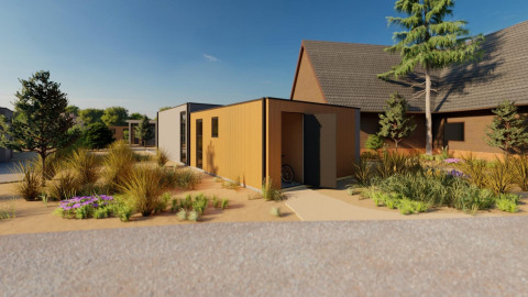 Lodge Cube Exclusif moderno a EuroParcs De Zeeuwse Duinen, Olanda, circondato dalla natura verde.