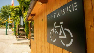 Sign for bike rental at Camping Centro Vacanze San Marino holiday park in San Marino, Italy.