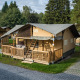 Safari telt ved Ranger Lodge med træterrasse, omgivet af træer og græs i et fredeligt naturområde.