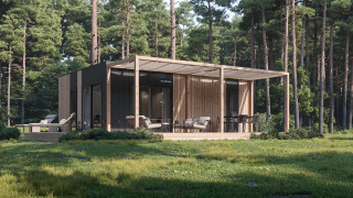 Moderne Thor cottage-lodge i naturskønt skovområde med solrig terrasse og komfortable udendørs møbler.