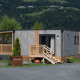 En moderne lodge ved Ossiacher See i Østrig, omgivet af natur og bjerge, under navnet Enzian Hottub.