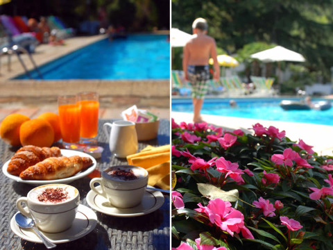 Breakfast with coffee and juice by the pool at Camping Delle Rose, Liguria, Italy, with flowers and sunbathers.