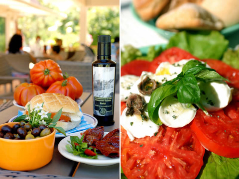 Tomates, mozzarella, aceitunas y hierbas frescas servidos al aire libre en Camping Delle Rose en Liguria, Italia.