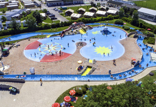Aerial view of Camping Terme Catez water park and pools with families and children in Slovenia.