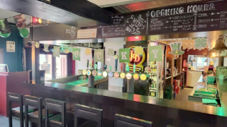 Bar area at Camp Diekirch holiday park in Diekirch, Luxembourg, decorated for St. Patrick’s Day festivities.