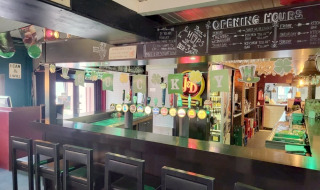 Bar area at Camp Diekirch holiday park in Diekirch, Luxembourg, decorated for St. Patrick’s Day festivities.