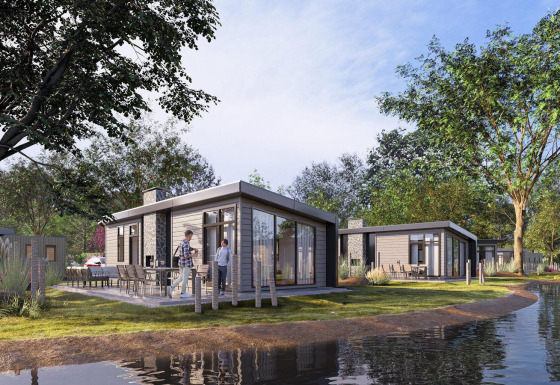 Cabañas modernas junto al lago en Zypendaal, Veluwepark de Bosgraaf, Países Bajos, rodeadas de naturaleza.