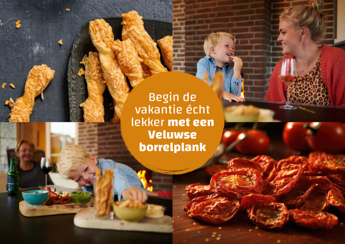 Gezin geniet van een Veluwse borrelplank met kaasstengels en tomaten in een gezellige tiny house.