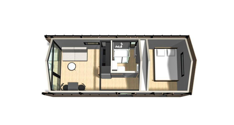 Floor plan of Tiny House I at Camping Si-Es-An in the Netherlands, showing bedroom, bathroom, and lounge area.