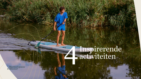 Persona haciendo paddle surf cerca de Villa Hottub en Resort de Parel, Países Bajos, rodeado de naturaleza.