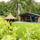 Family Lodge Deluxe moderna con giardino curato e area relax all'aperto a De Thijmse Berg, Paesi Bassi.