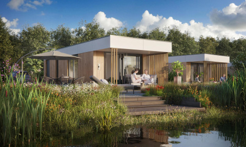 Water Lodge 2 moderna con jacuzzi en Hofparken Wiltershaar, Países Bajos, rodeada de naturaleza y un estanque.
