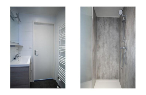 Modernes Badezimmer in der Nature Lodge, De Thijmse Berg, Niederlande, mit Waschbecken, Tür und Dusche.