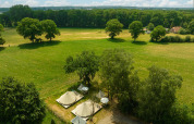 Aerial view of Happy in the meadow teepee tent with private bathroom at Holiday Park Mölke, Netherlands.