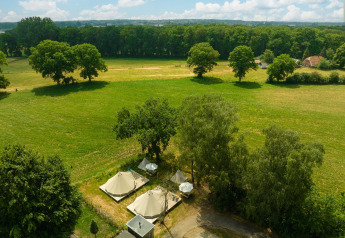 Aerial view of Happy in the meadow teepee tent with private bathroom at Holiday Park Mölke, Netherlands.